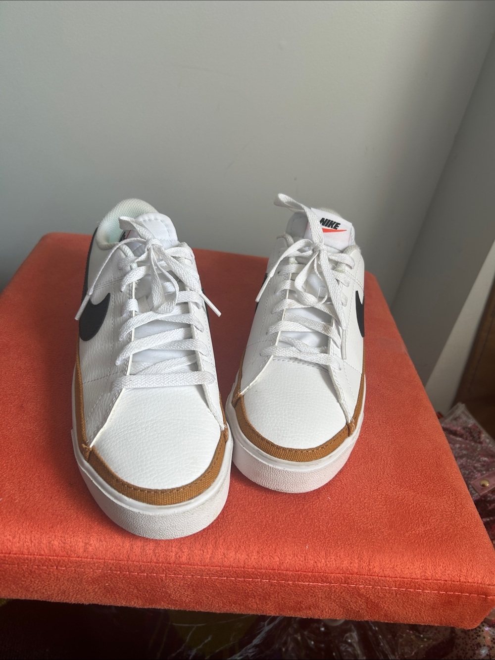 Nike White Sneakers with Brown Trim and Black Swoosh